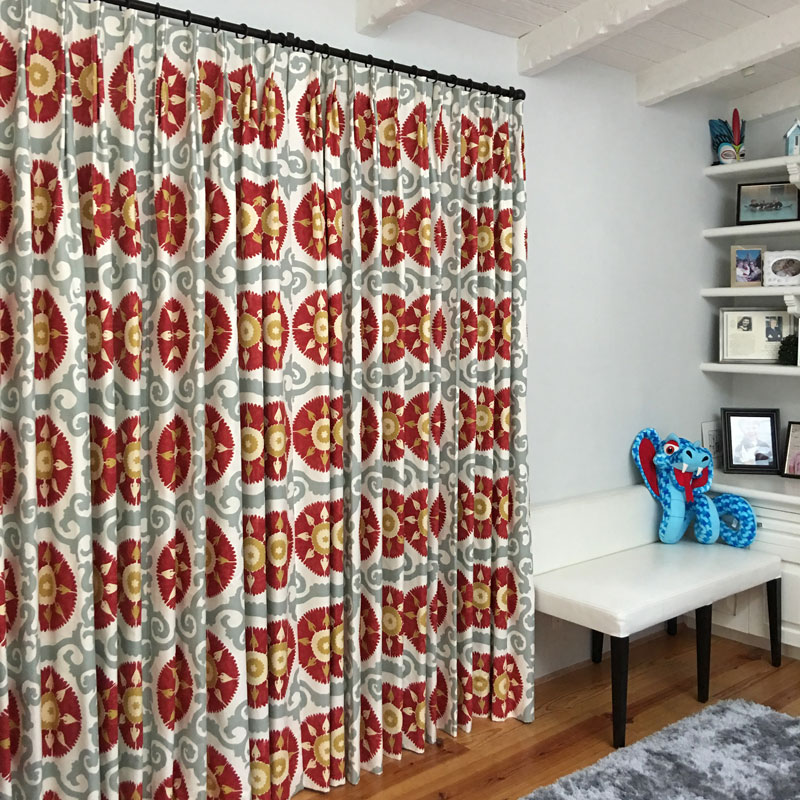 Patterned drapery featured by Delta Swell